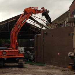 Our team beginning to dismantle a roof