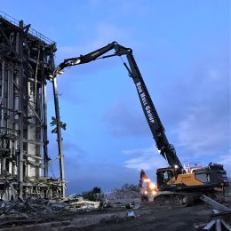 Large building roof being dismantled