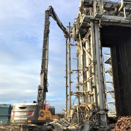 Machinery being used to demolish a building