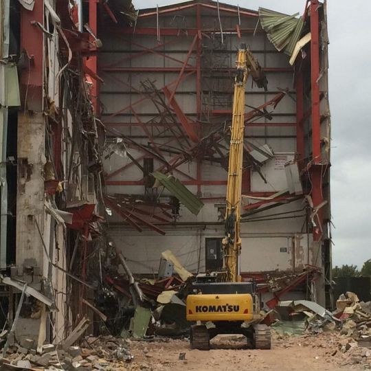 Building undergoing demolition by Ron Hull