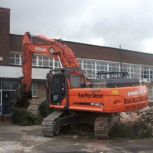 Ron Hull group digger at the start of a demolition