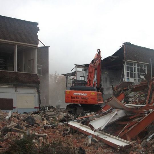 Ron Hull machine at work on a site demolition
