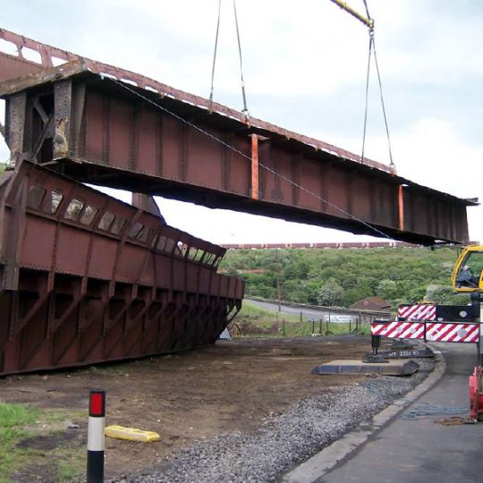 Decomissioned metal structure being removed