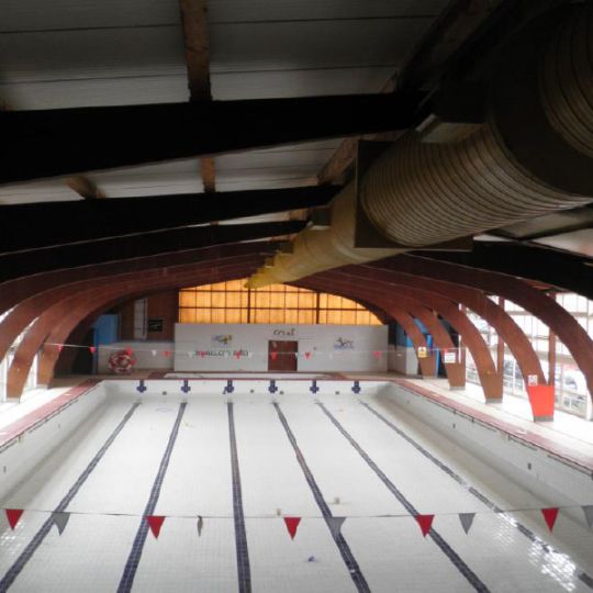 Empty swimming pool before demolition