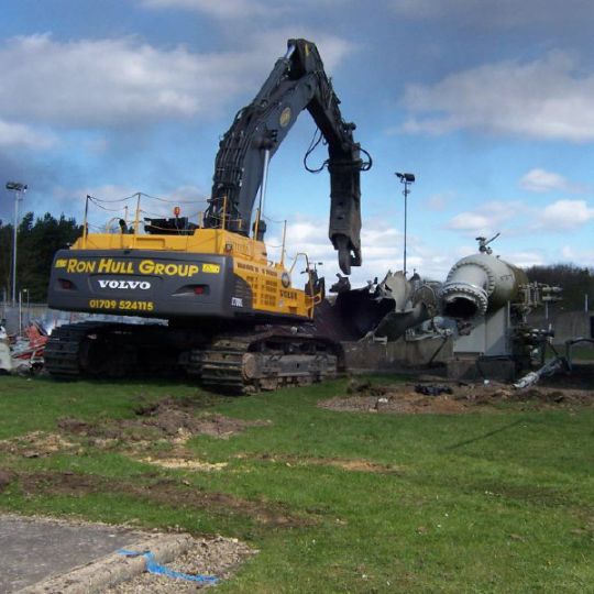 Metal industrial equipment being cleared