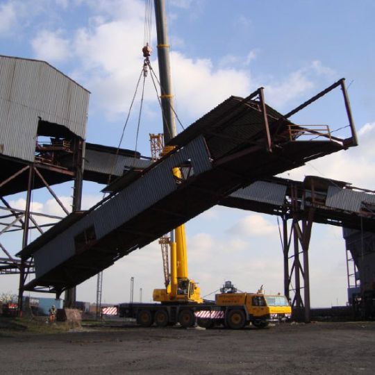 Industrial facility equipment being dismantled