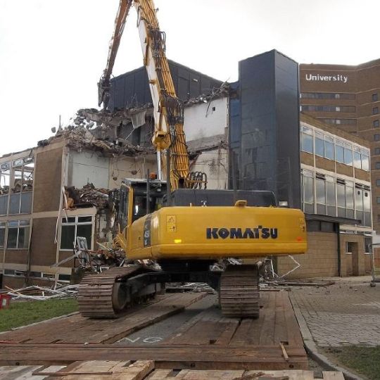 Building being demolished by Ron Hull equipment