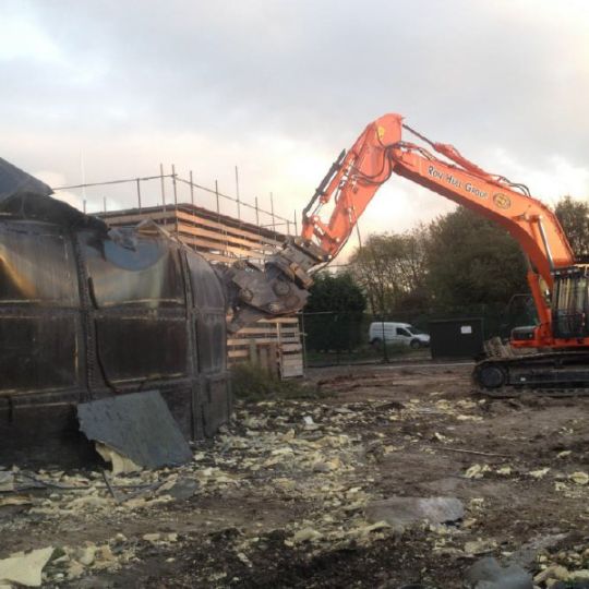 Demolition in progress with a Ron Hull Ltd